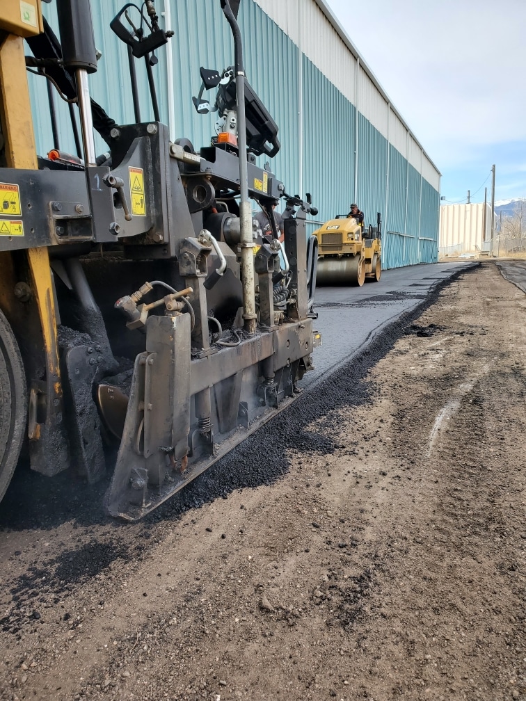 Parking lot removal, grading and repaving restriping