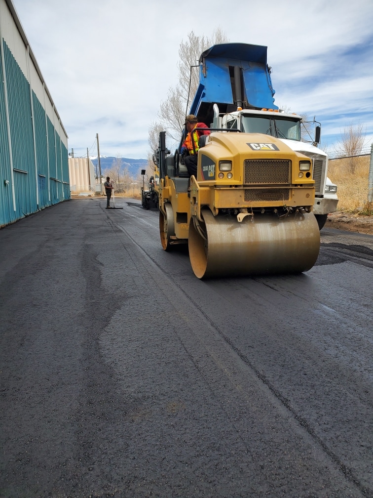 Parking lot removal, grading and repaving restriping